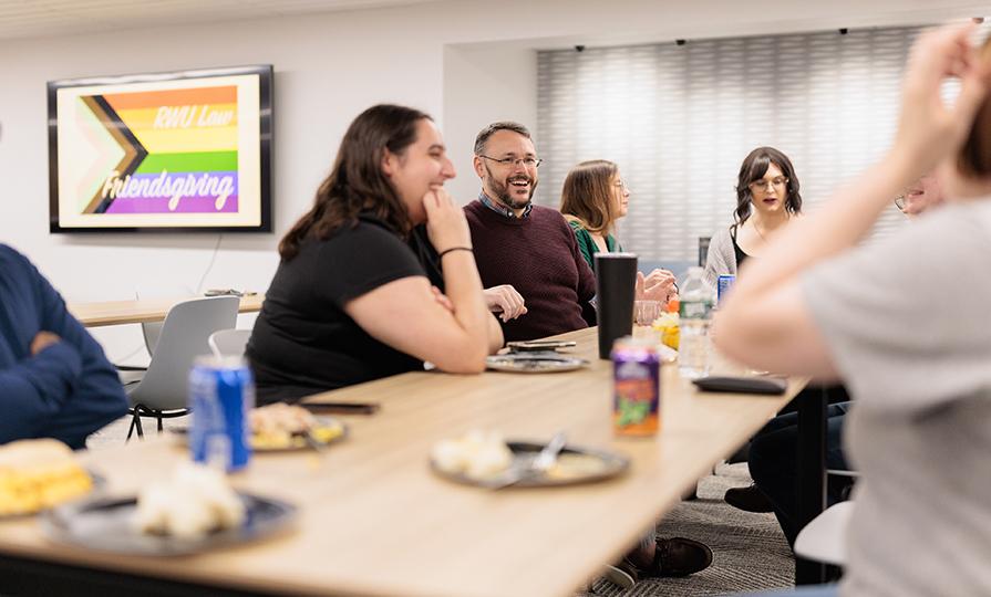 Students around a Friendsgiving table