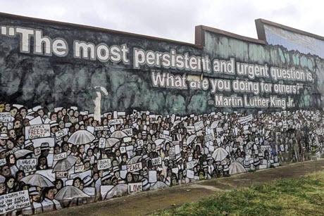 Mural with the words "The most persistent and urgent question is, what are you doing for others?" Martin Luther King Jr.
