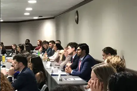 Students from the class of 2026 in lecture hall seats for orientation