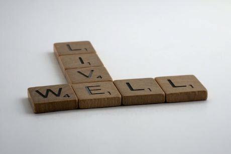 Letter tiles the spell "Live Well"
