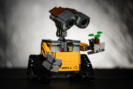 WALL-E a robot holding a small plant