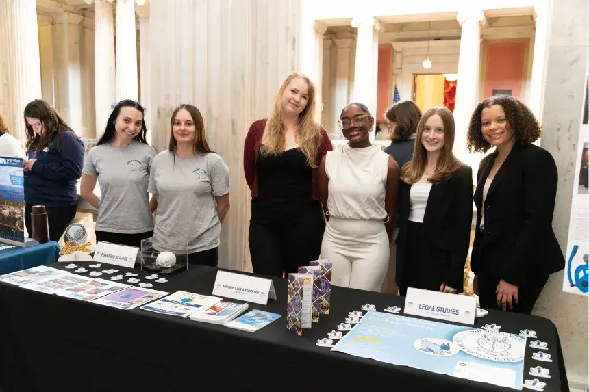 RWU students staff displays showcasing legal clinics, academic programs, and applied learning experiences