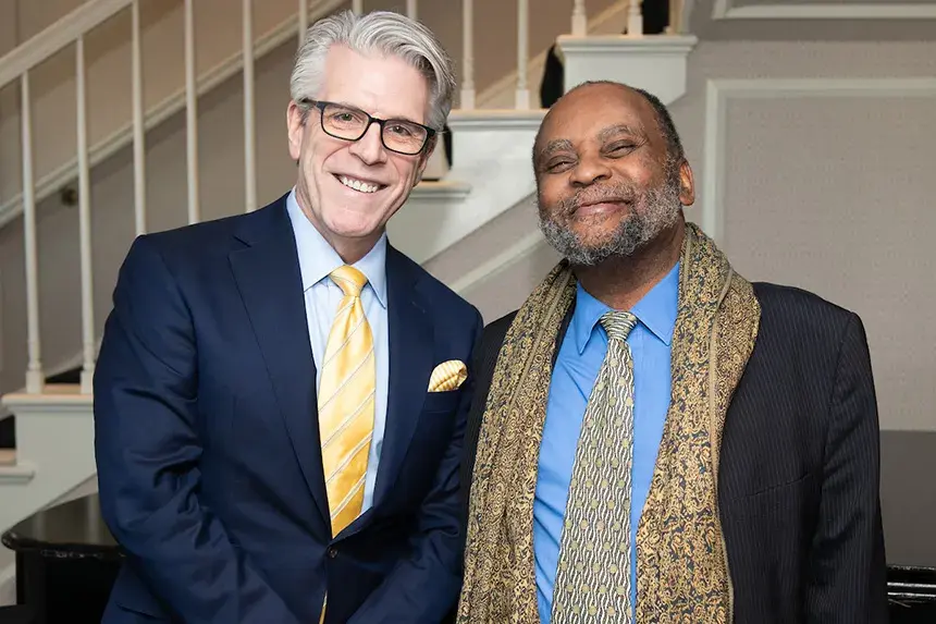 Dean Bowman and Bernard Freamon post for a photo 